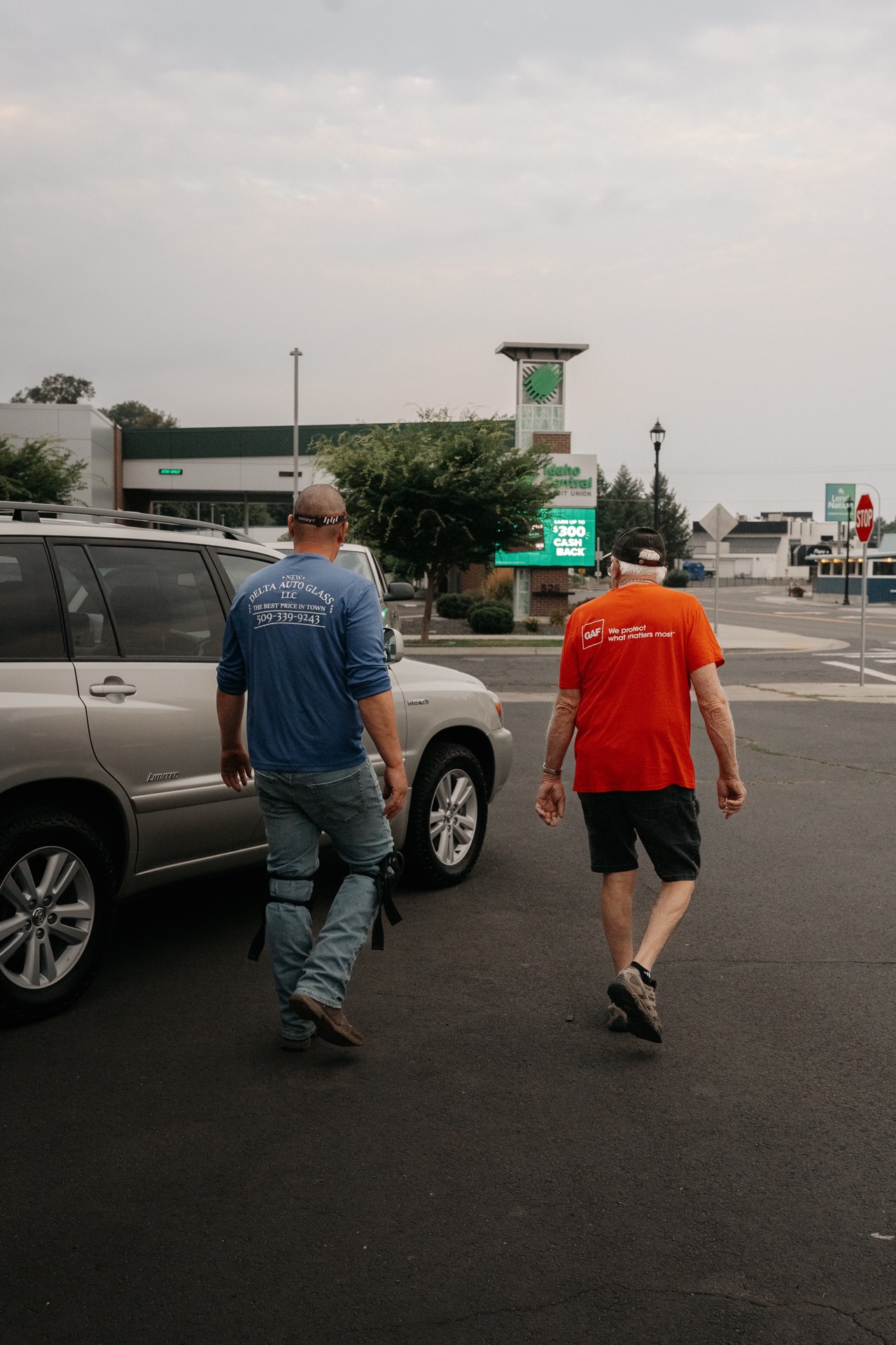 New Delta technician walking with customer to their vehicle